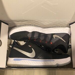 Nike PG 4 basketball shoe in the black, white, and light smoke grey
